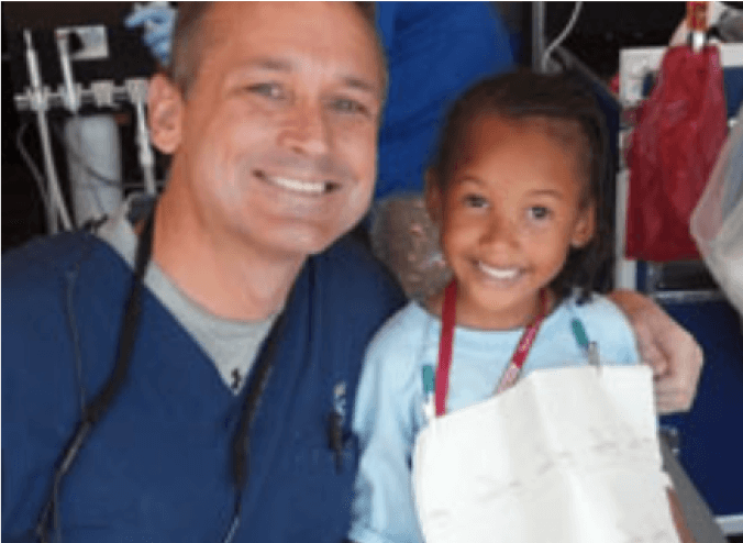 hero4 Dentist with little kid